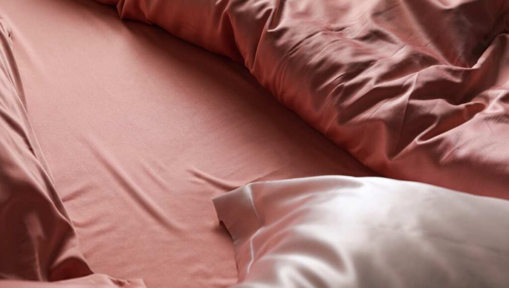 Is it haram to sleep on silk?